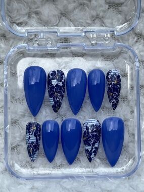 Handmade stiletto press on nails featuring shades of blue and white with floral